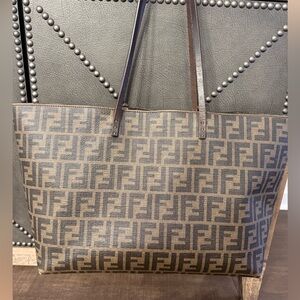 Fendi authentic vintage tote bag in the iconic brown F logo. Sold as is.